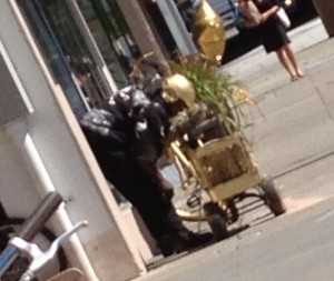 gold bike, gold boom box, gold helmet, gold balloons.